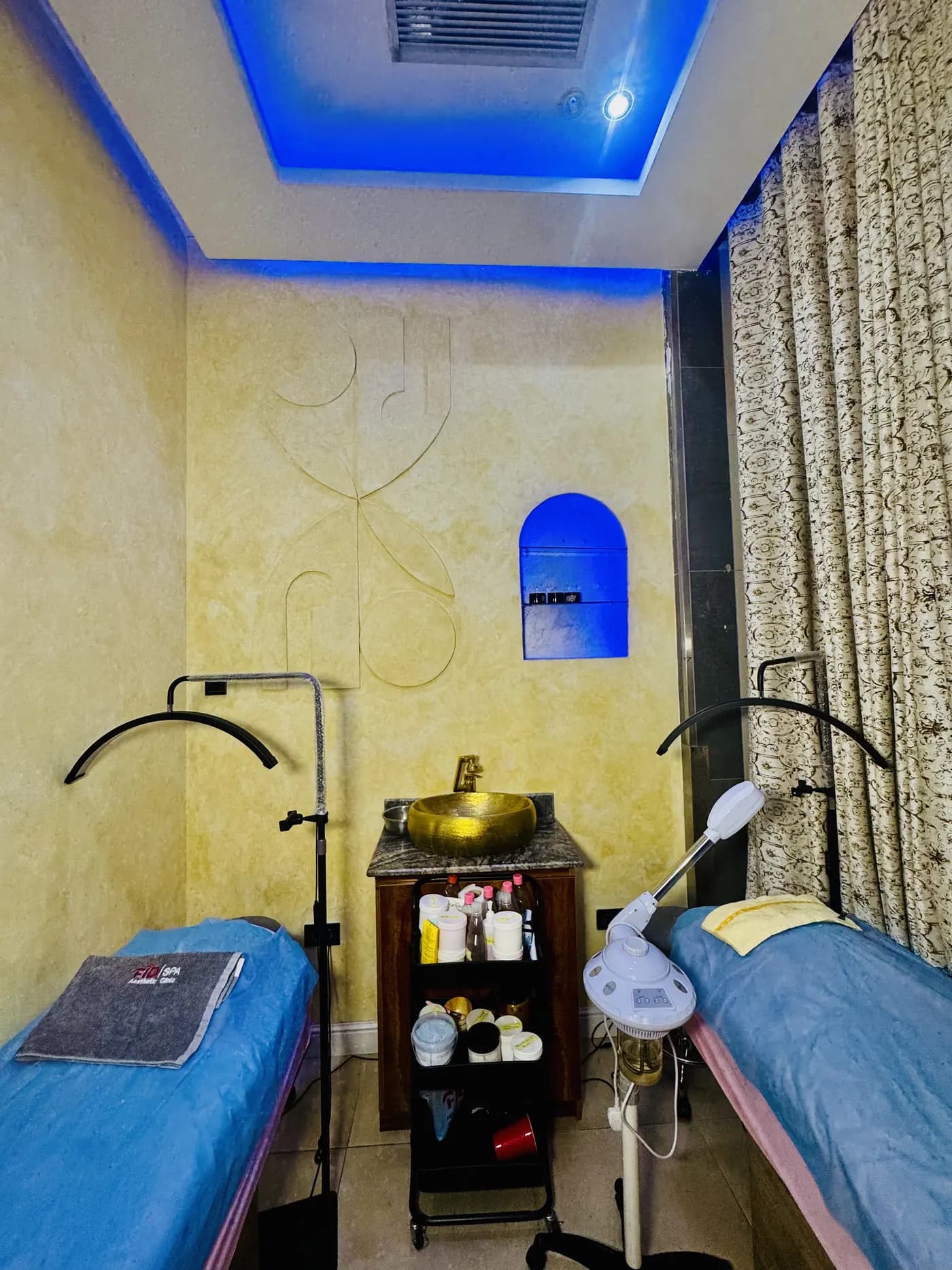 Facial room with steamer and two beds