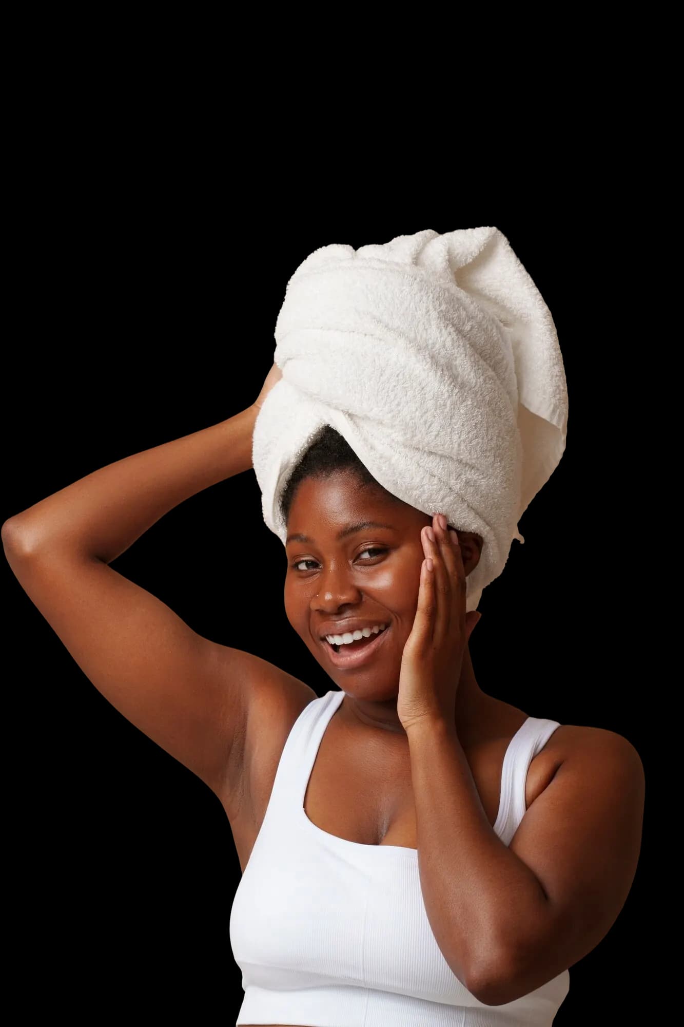Smiling guest wrapped in a towel after a treatment